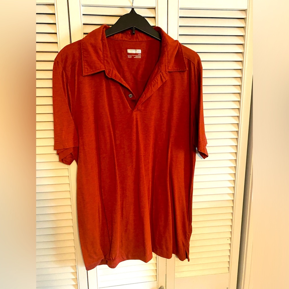 Red Marmot polo in size L